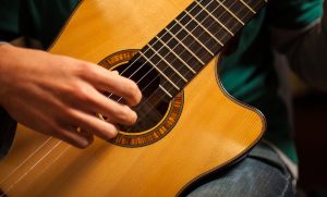 Man playing a guitar