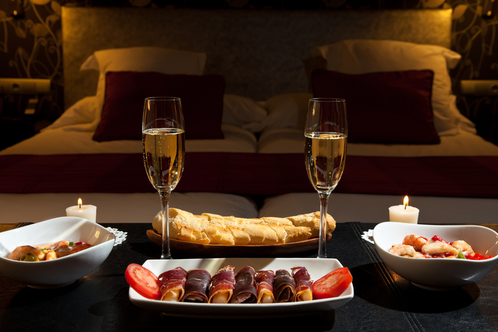 Dinner with champagne in the bedroom
